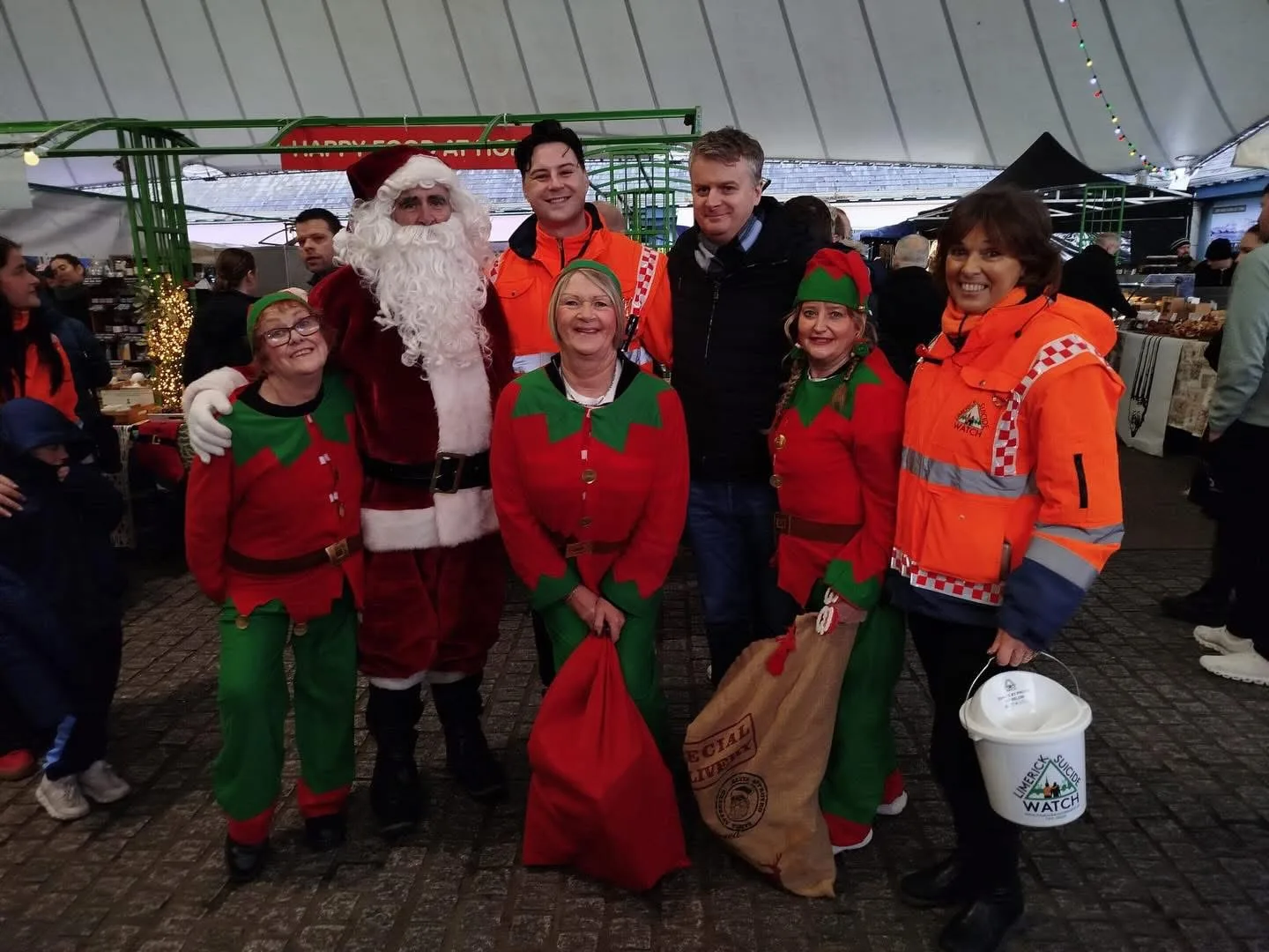 Santa and LSW elves with the public at the Milk Market